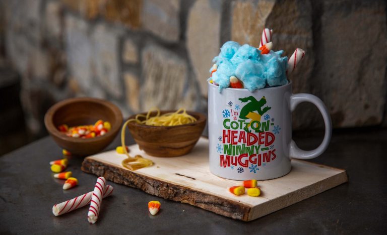 Elf-themed mug full of candy