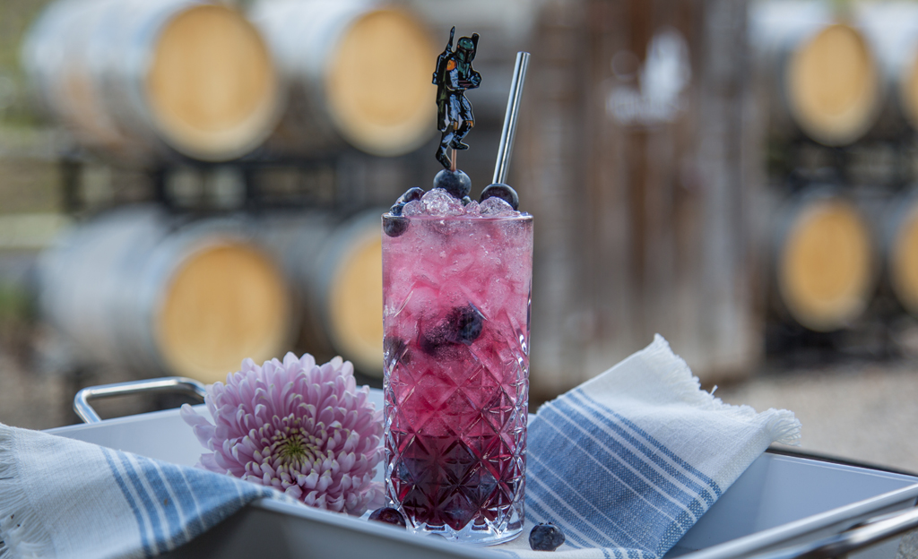 cocktail with pink flower and Star Wars figurine